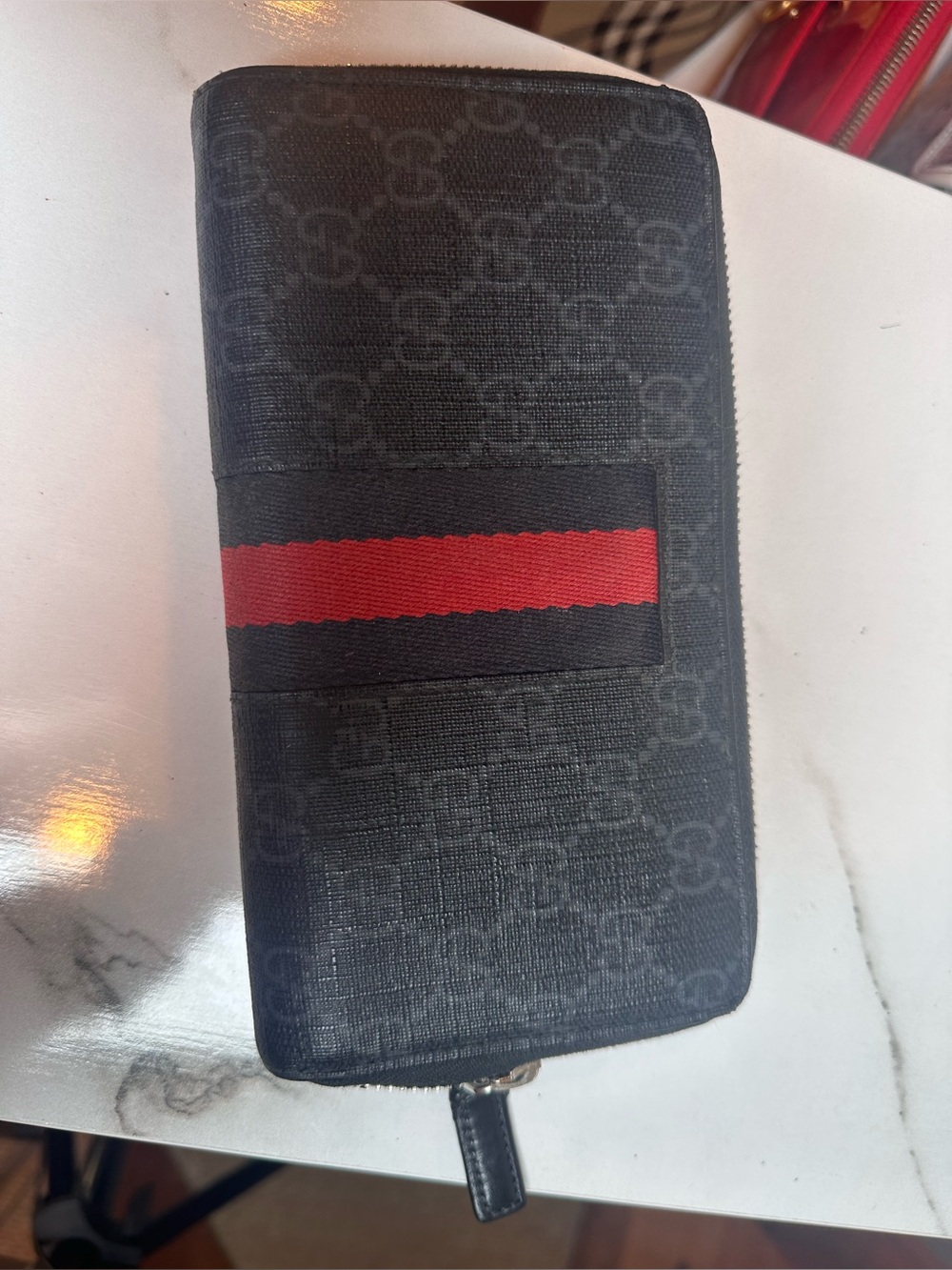 Gucci Web Zip Around Wallet GG
Coated Canvas